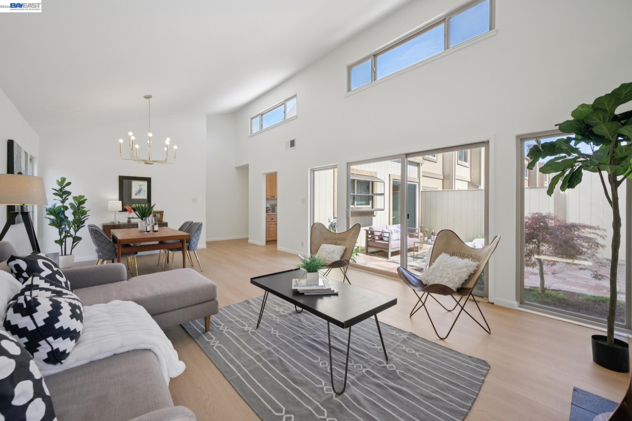 3201 Phoenix Lane Alameda, CA 94502 - Photo 11 of 58 a living room with furniture or outdoor view and a potted plant