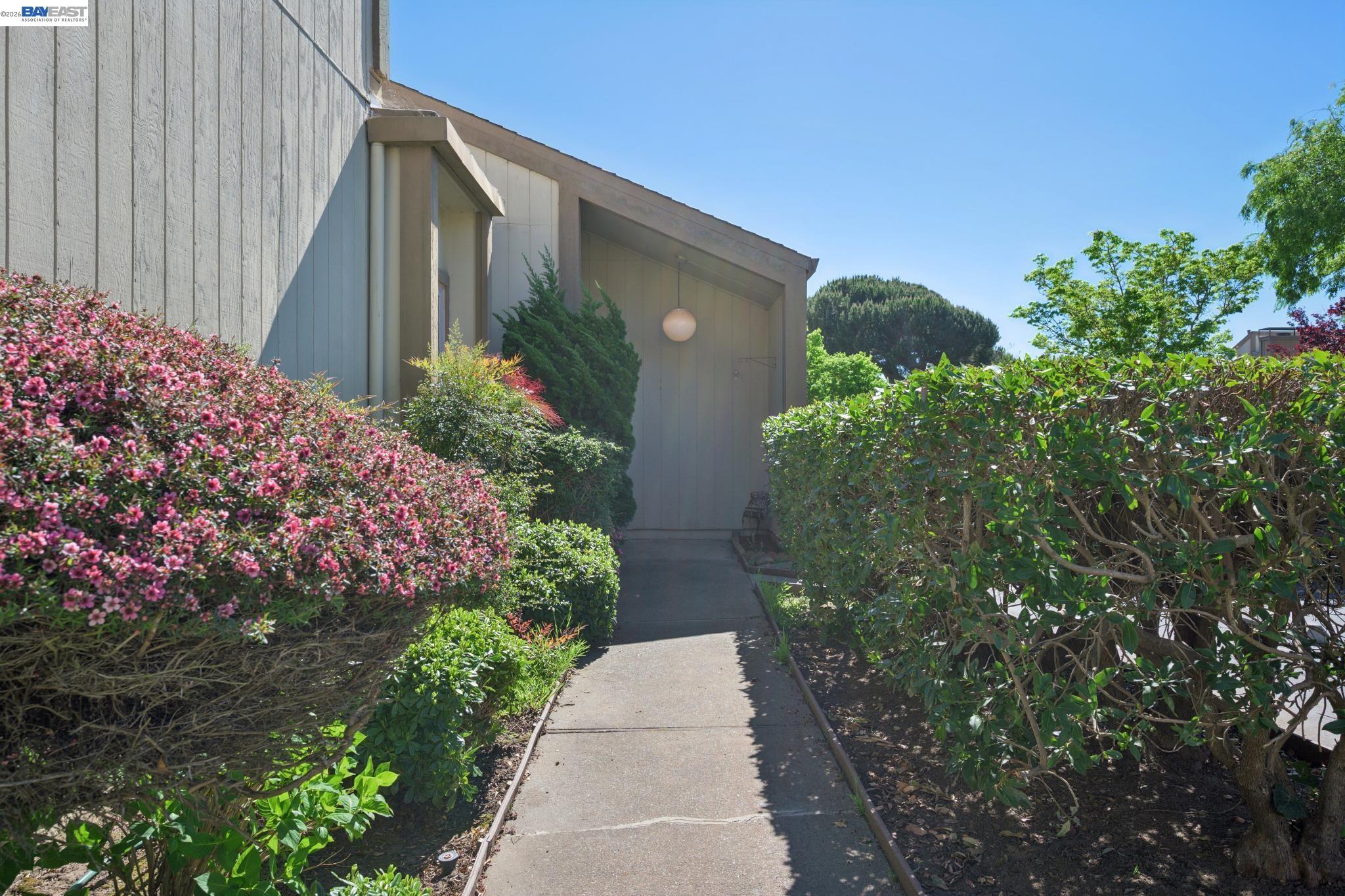 3201 Phoenix Lane Alameda, CA 94502 - Photo 2 of 58 a couple of flower plants in front of house