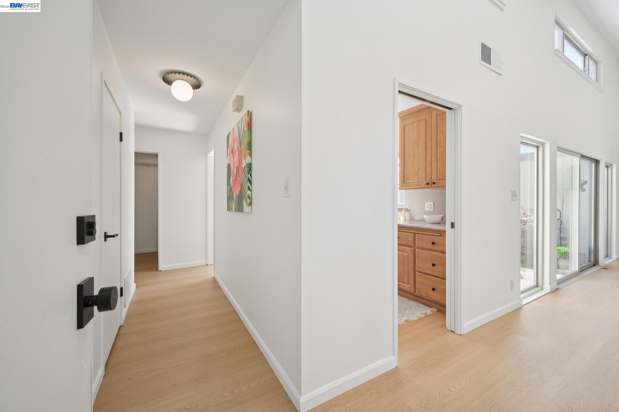 3201 Phoenix Lane Alameda, CA 94502 - Photo 3 of 58 a view of a hallway with closet and a bathroom