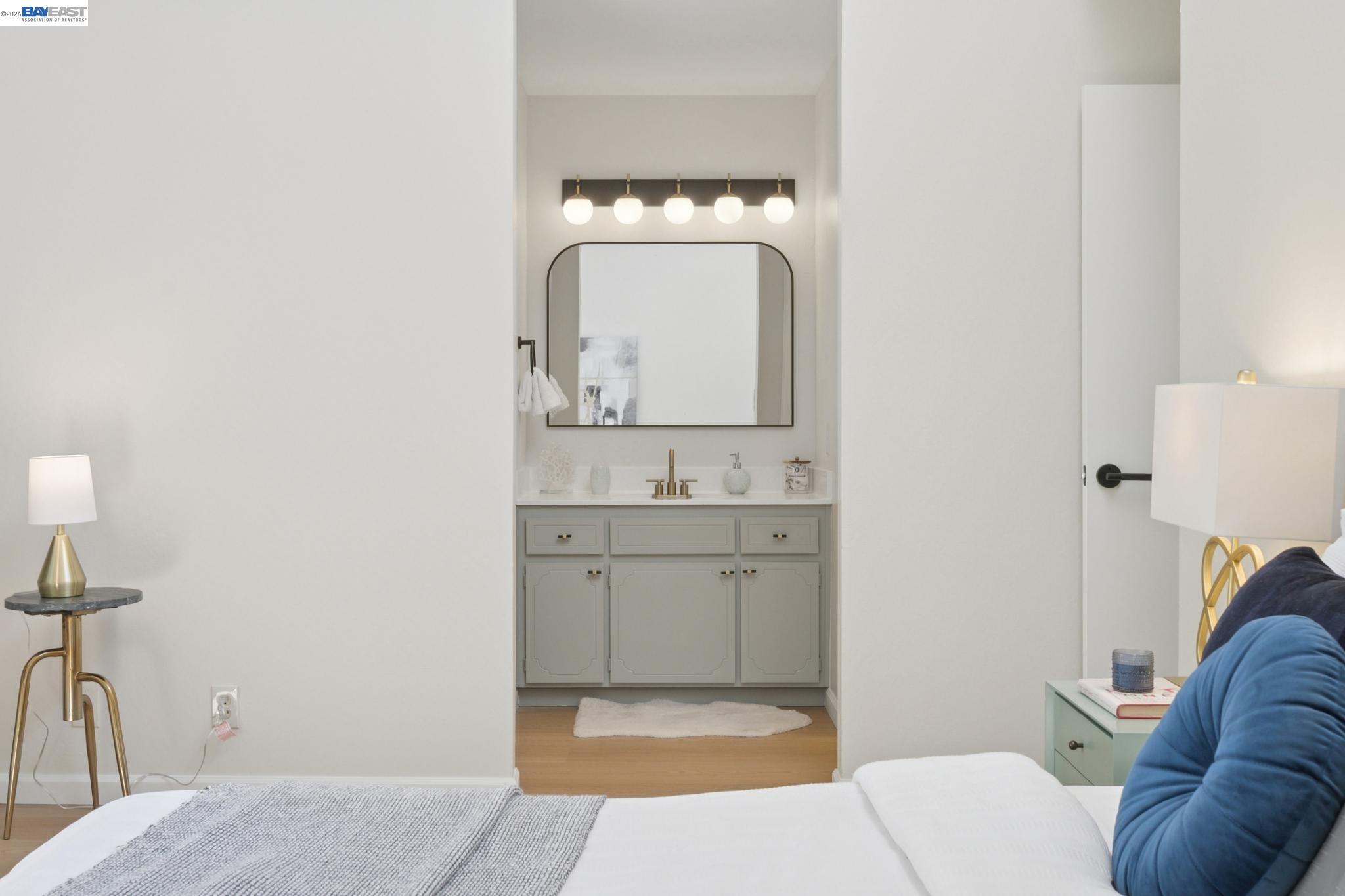 3201 Phoenix Lane Alameda, CA 94502 - Photo 31 of 58 a bathroom with a sink and a mirror