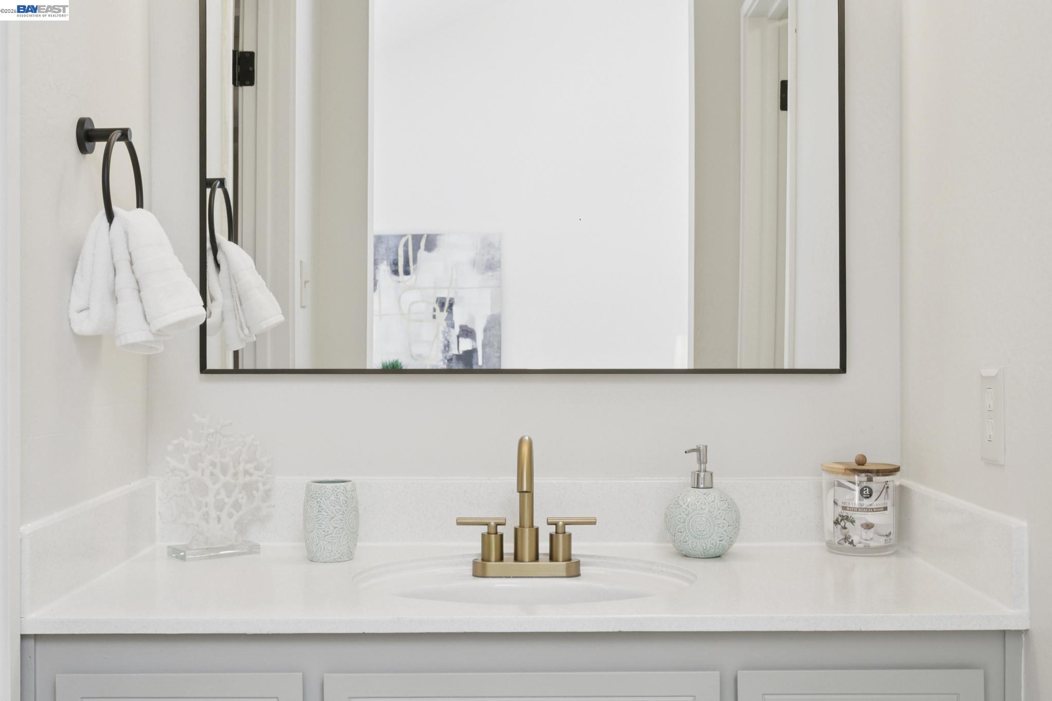 3201 Phoenix Lane Alameda, CA 94502 - Photo 34 of 58 a bathroom with vanity mirror