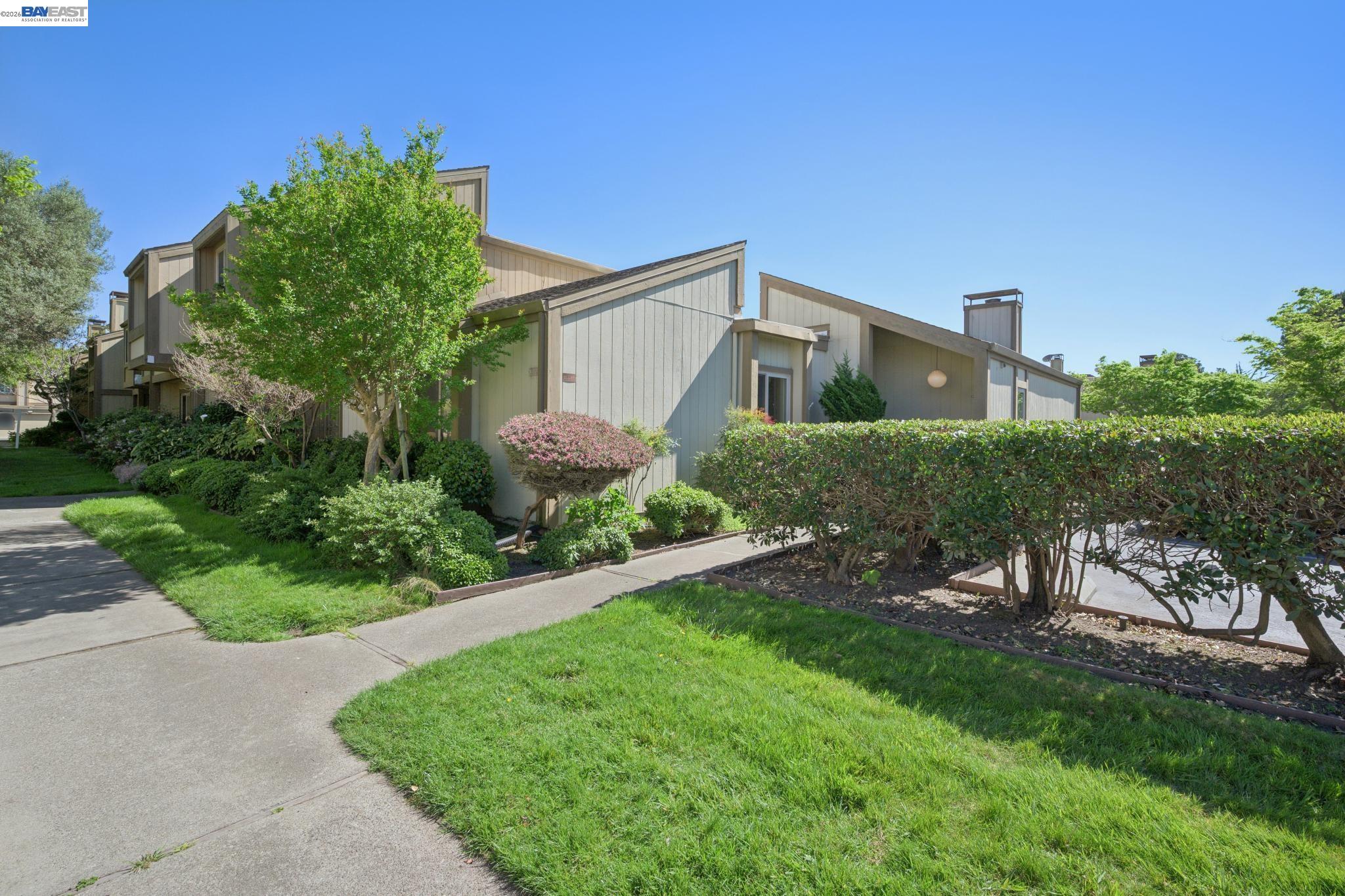 3201 Phoenix Lane Alameda, CA 94502 - Photo 44 of 58 a front view of a house with a yard