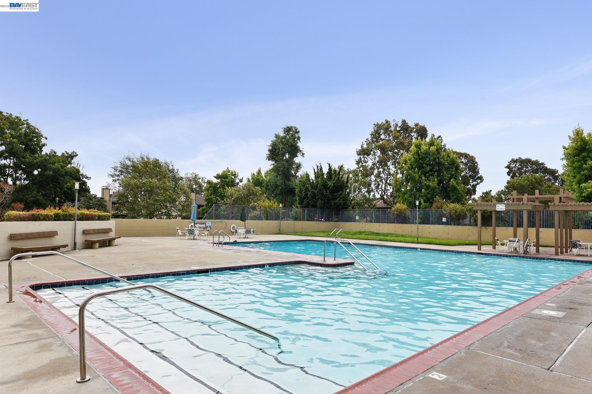 3201 Phoenix Lane Alameda, CA 94502 - Photo 52 of 58 a view of a swimming pool with a yard