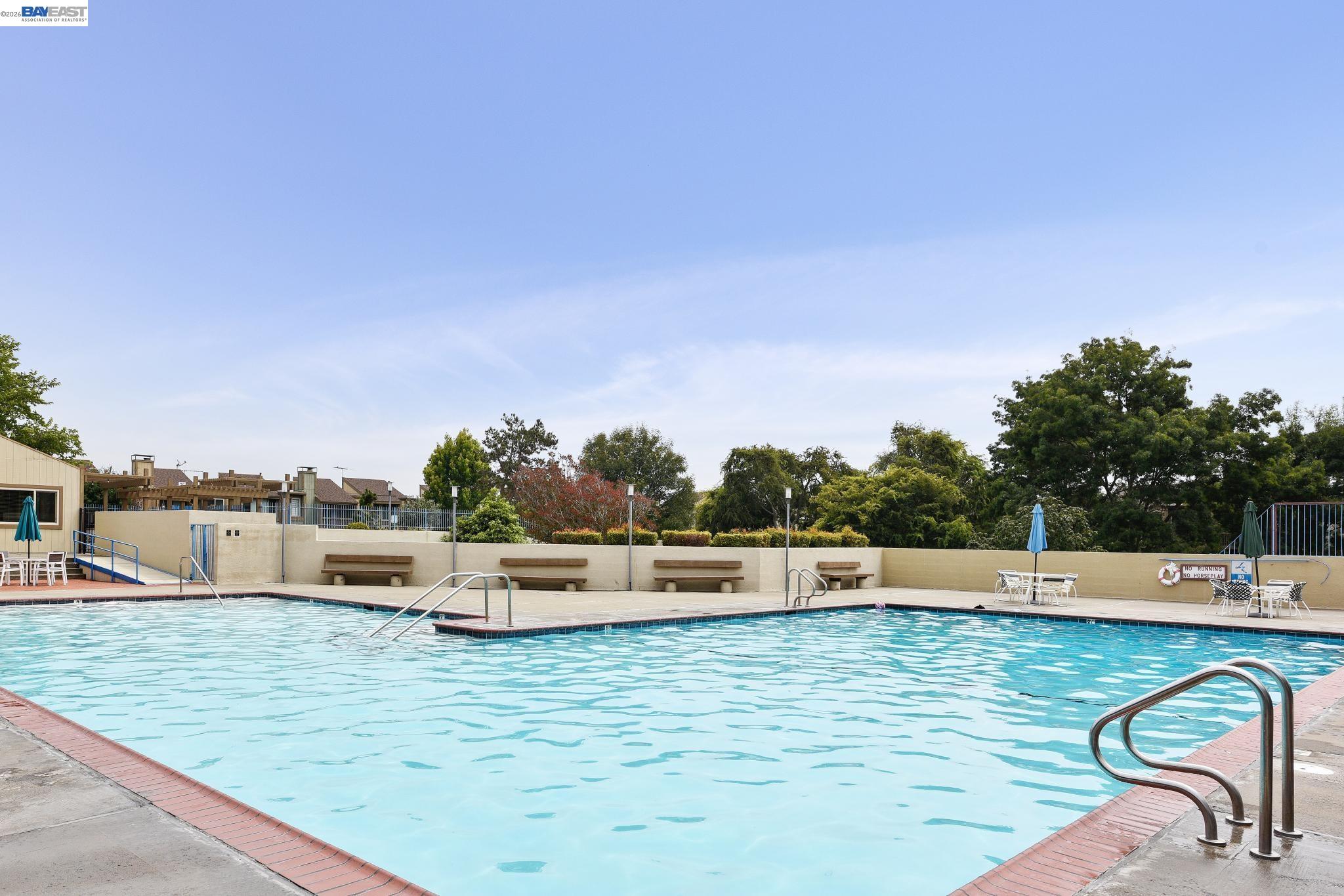 3201 Phoenix Lane Alameda, CA 94502 - Photo 53 of 58 a view of a swimming pool with an outdoor seating