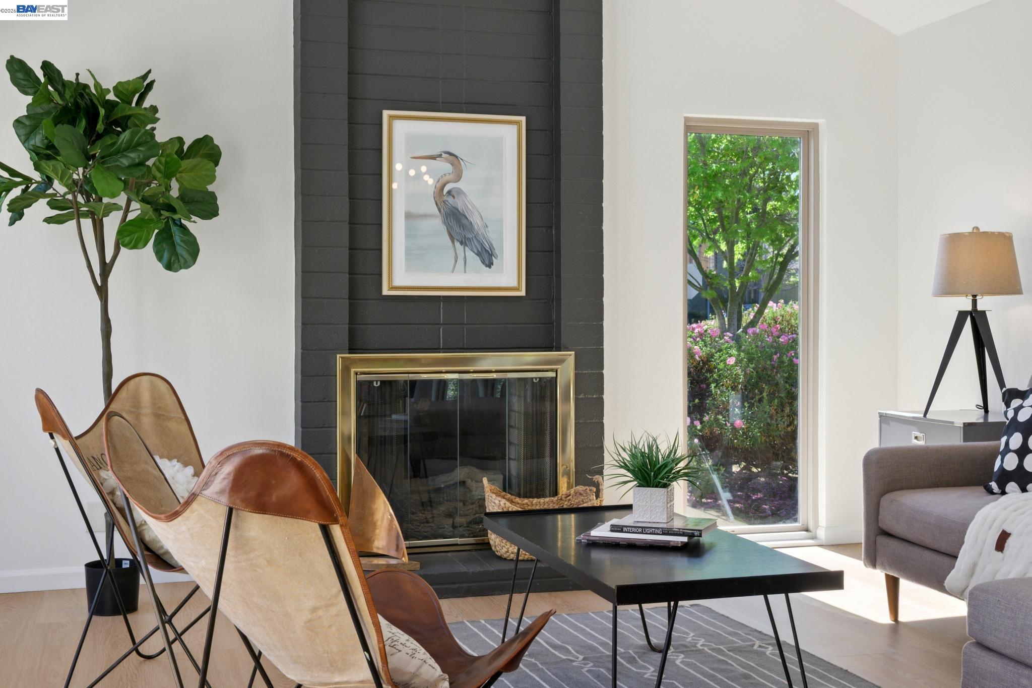 3201 Phoenix Lane Alameda, CA 94502 - Photo 9 of 58 a living room with furniture and a potted plant