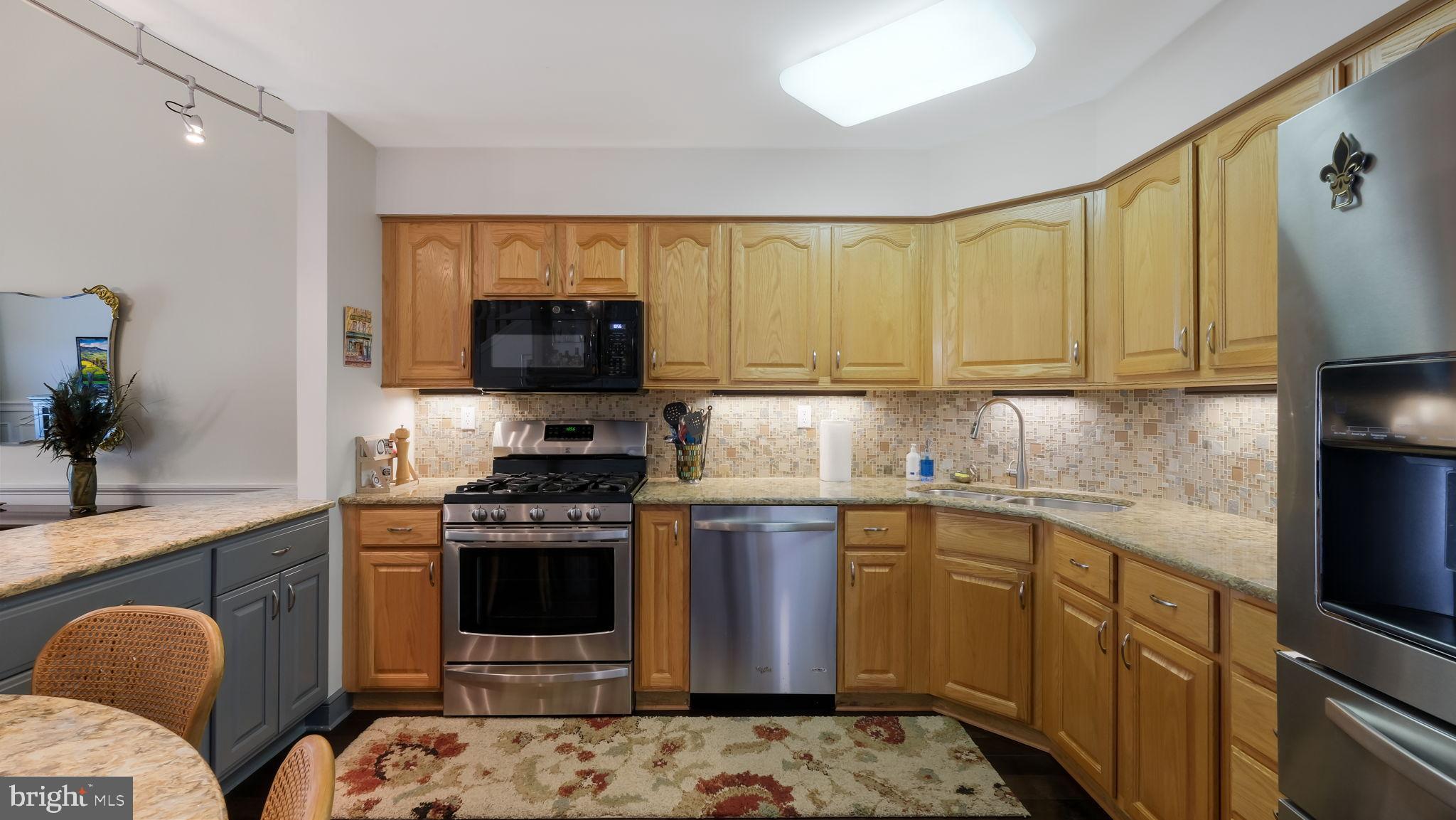 163 Progress Drive Doylestown, PA 18901 - Photo 12 of 35 Charming kitchen with warm wood cabinetry.