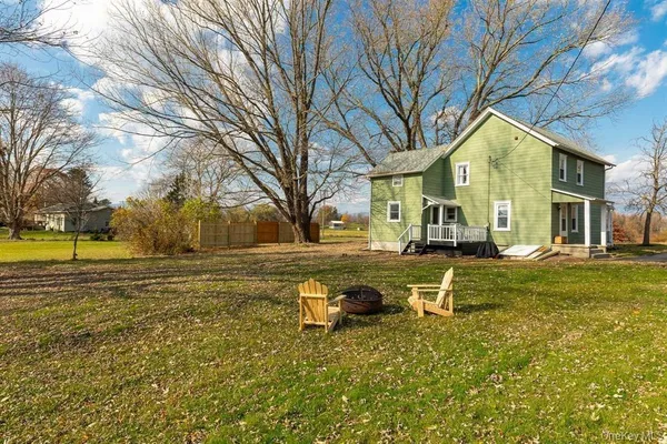 a view of a swimming pool with tree s