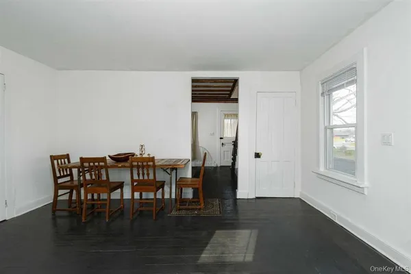 a view of an entryway with a window