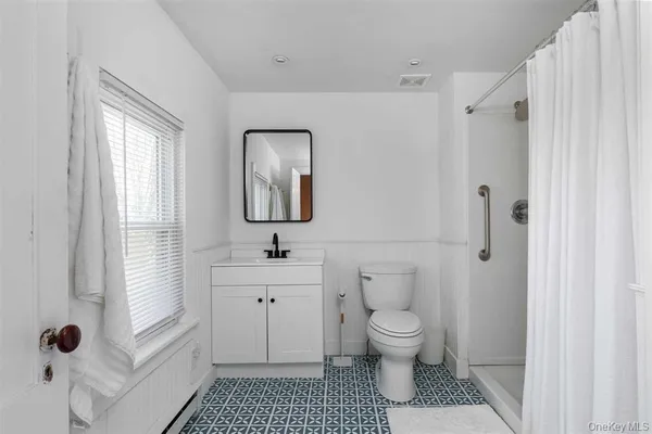 a bedroom with a bed and a closet