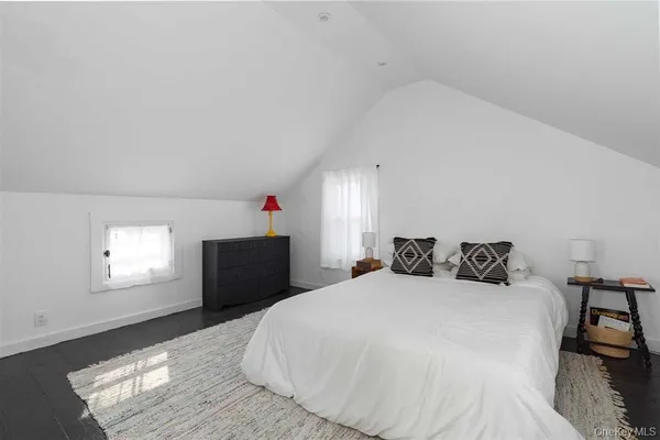 a view of a room with wooden floor and closet