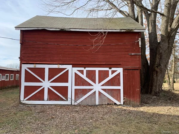 a view of outdoor space and front view of a house