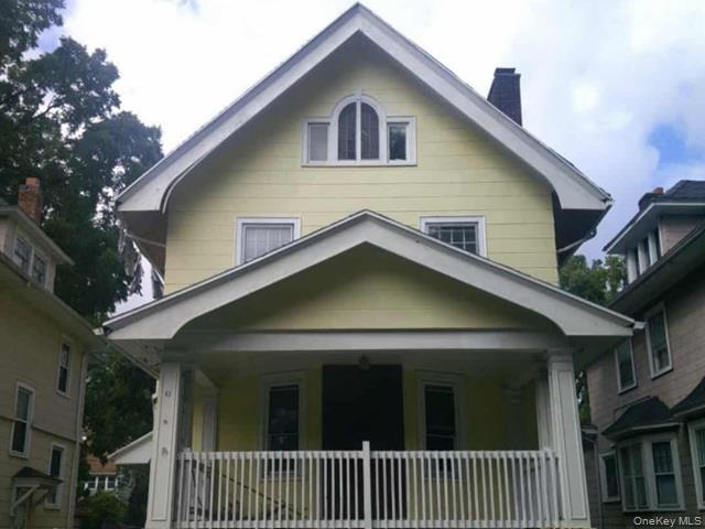 63 Rugby Avenue Rochester, NY 14619 - Photo 1 of 23 a front view of a house