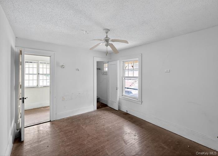 63 Rugby Avenue Rochester, NY 14619 - Photo 15 of 23 a view of an empty room with a window