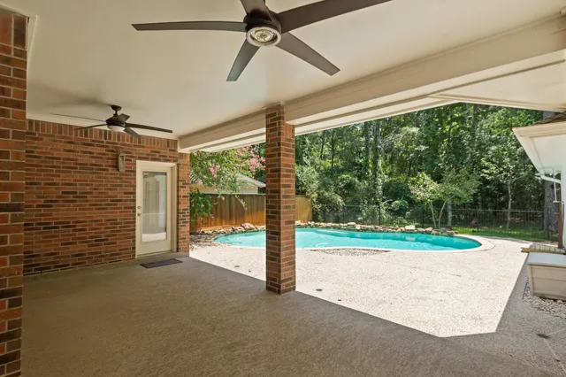 a view of a room with porch and wooden floor