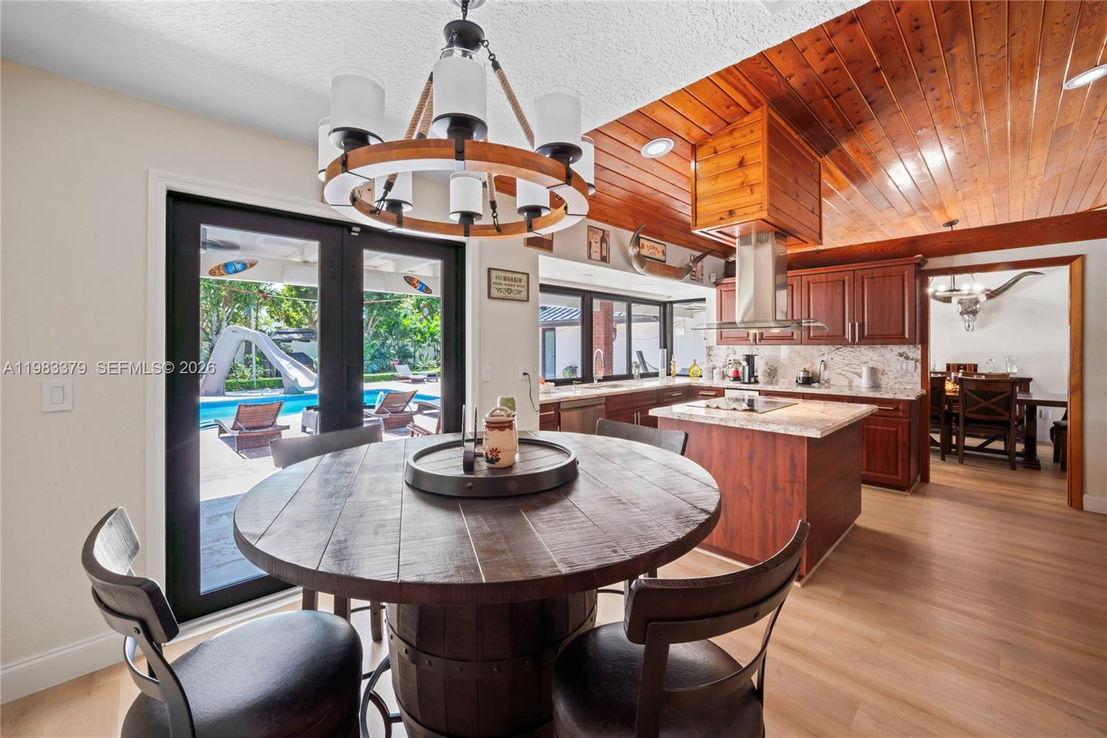 10320 Southwest 139th Street Miami, FL 33176 - Photo 40 of 100 a view of a dining room with furniture window and outside view