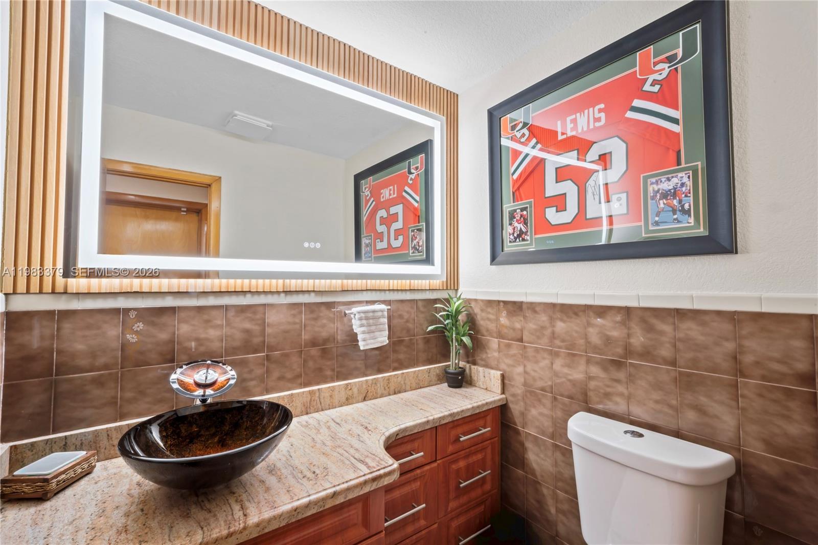 10320 Southwest 139th Street Miami, FL 33176 - Photo 47 of 100 a bathroom with a sink and a mirror