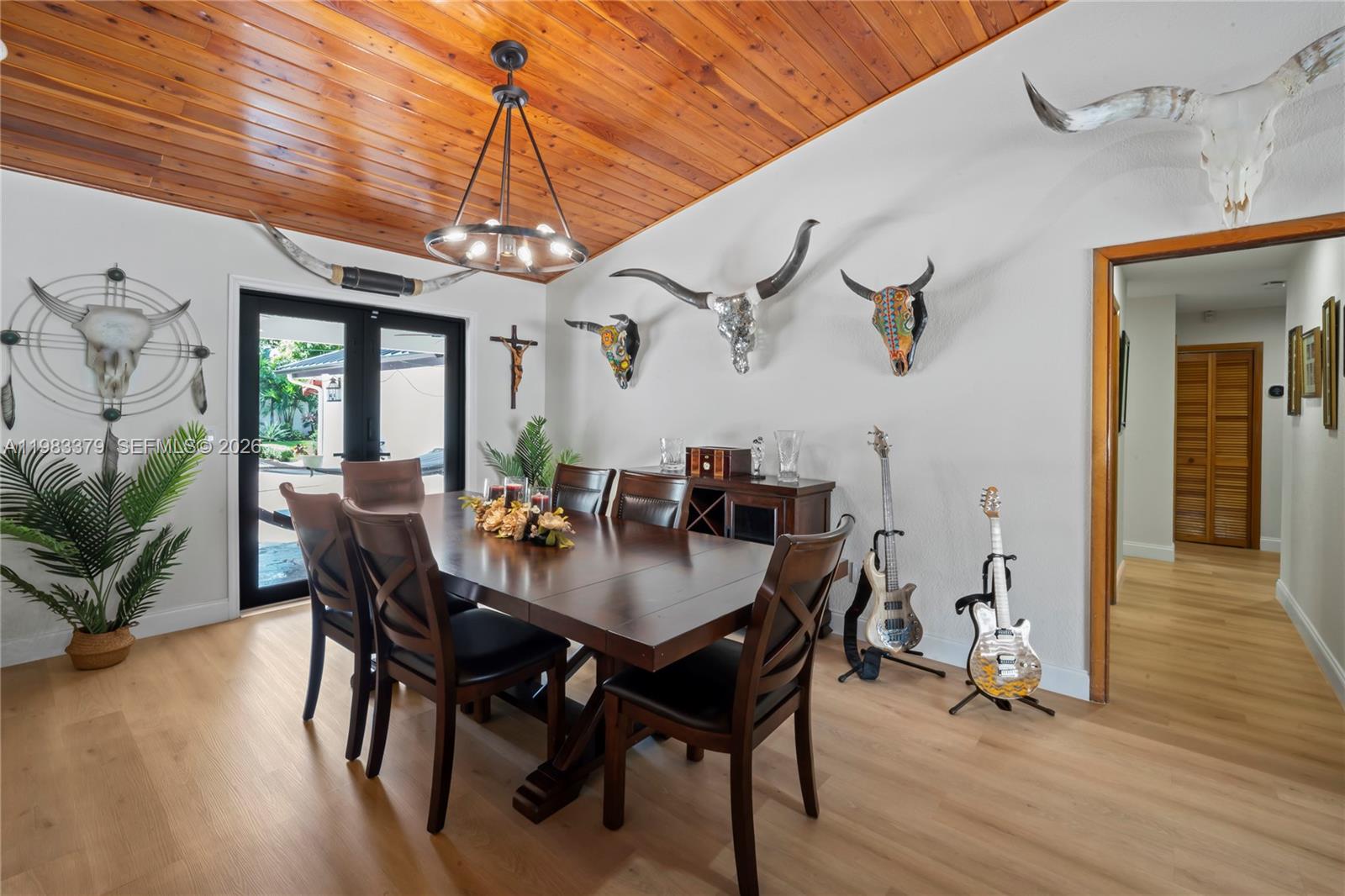 10320 Southwest 139th Street Miami, FL 33176 - Photo 89 of 100 a view of a dining room with furniture window and wooden floor