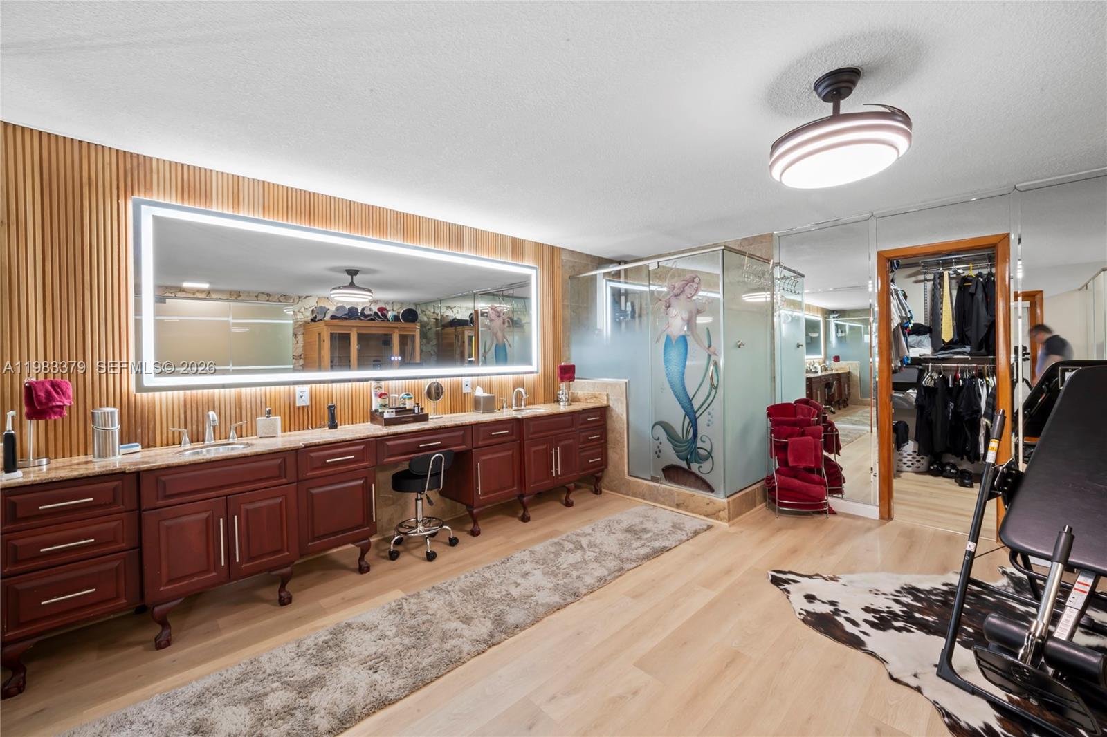 10320 Southwest 139th Street Miami, FL 33176 - Photo 93 of 100 a room with lots of wooden furniture and windows