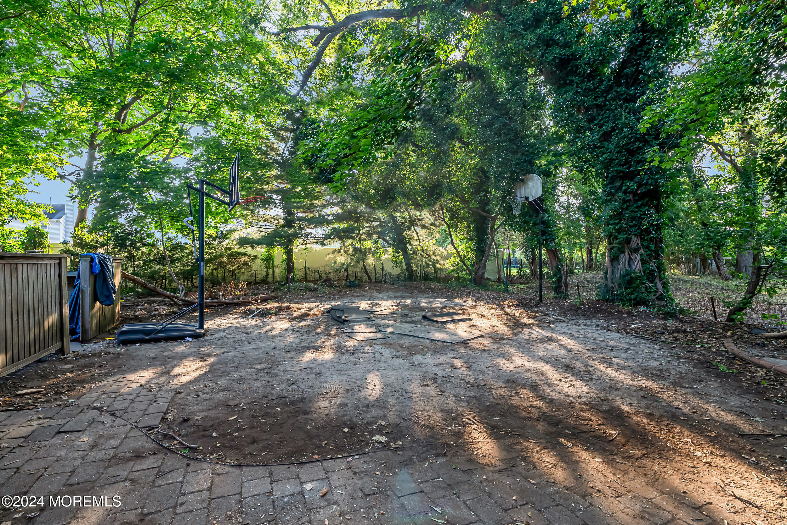 32 Woodrow Street Oakhurst, NJ 07755 - Photo 16 of 19 a view of backyard with green space