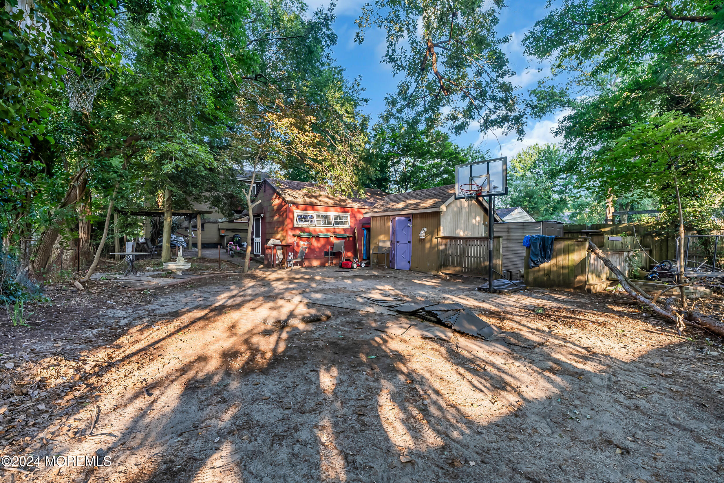 32 Woodrow Street Oakhurst, NJ 07755 - Photo 17 of 19 a view of a house with backyard