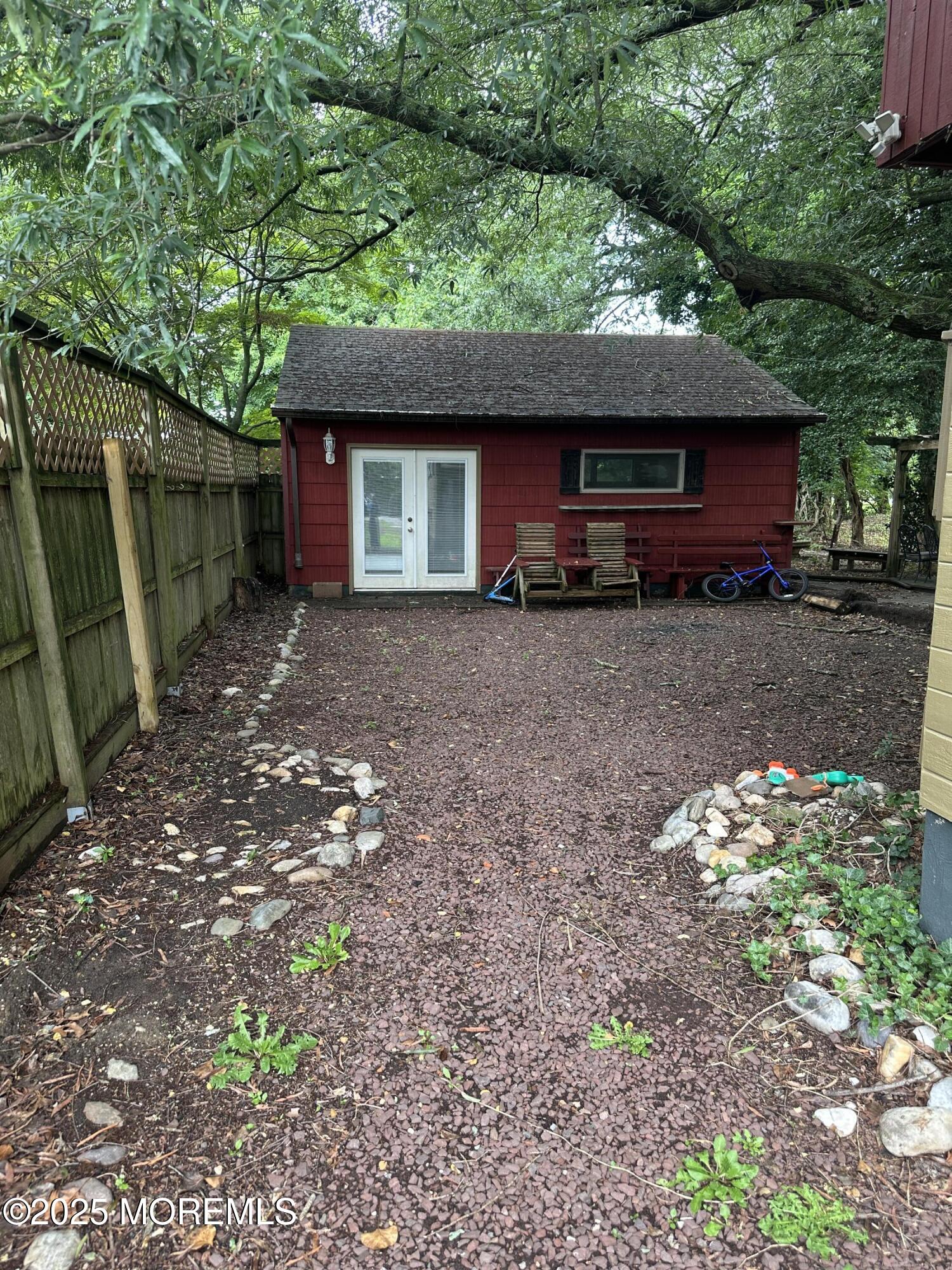 32 Woodrow Street Oakhurst, NJ 07755 - Photo 18 of 19 a view of a house with a yard
