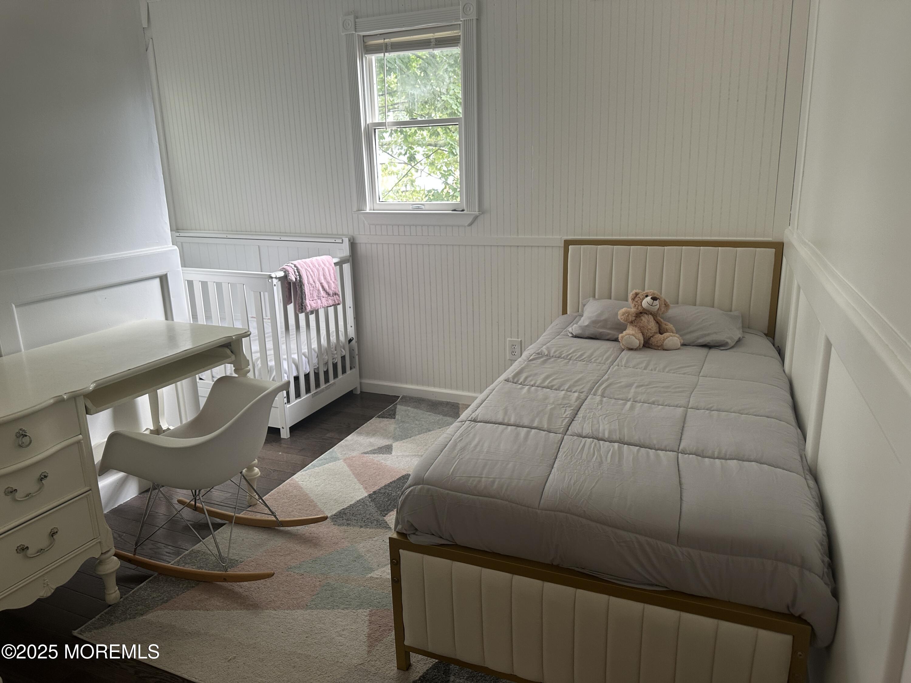 32 Woodrow Street Oakhurst, NJ 07755 - Photo 8 of 19 a bedroom with a bed and a window