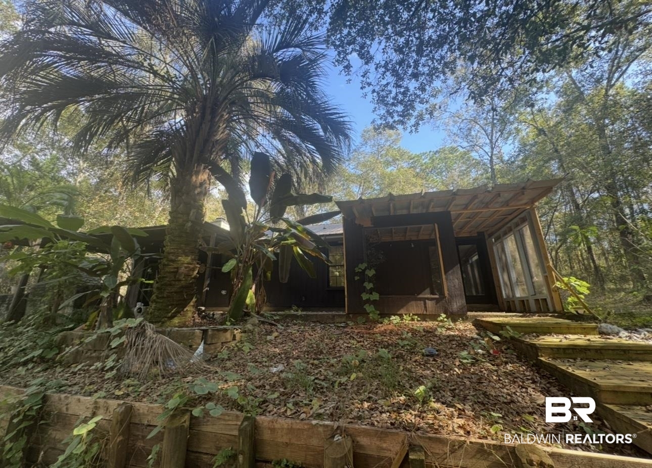 23341 County Road 49 Silverhill, AL 36576 - Photo 1 of 23 View of outdoor structure with a sunroom