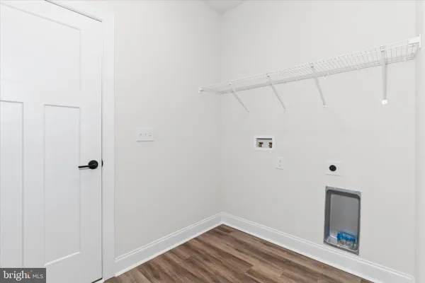 an empty room with a empty space and windows
