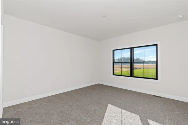 a bathroom with a sink vanity and a mirror