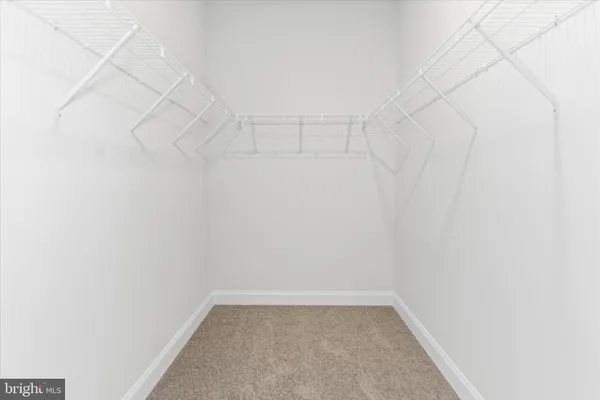 a view of balcony with floor to ceiling window and stairs