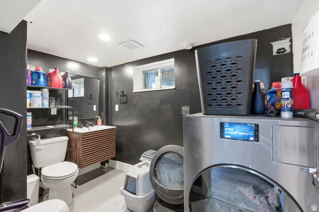 2323 North 720 West Clinton, UT 84015 - Photo 26 of 34 Half bathroom featuring vanity and washer / dryer