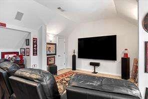 802 Pathview Court Dacula, GA 30019 - Photo 23 of 56 a bedroom with a bed and a flat screen tv