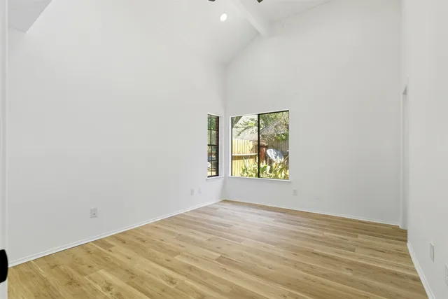 an empty room with windows