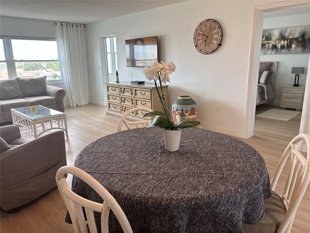 4725 Cove Circle, Unit 405 St. Petersburg, FL 33708 - Photo 2 of 23 a living room with furniture