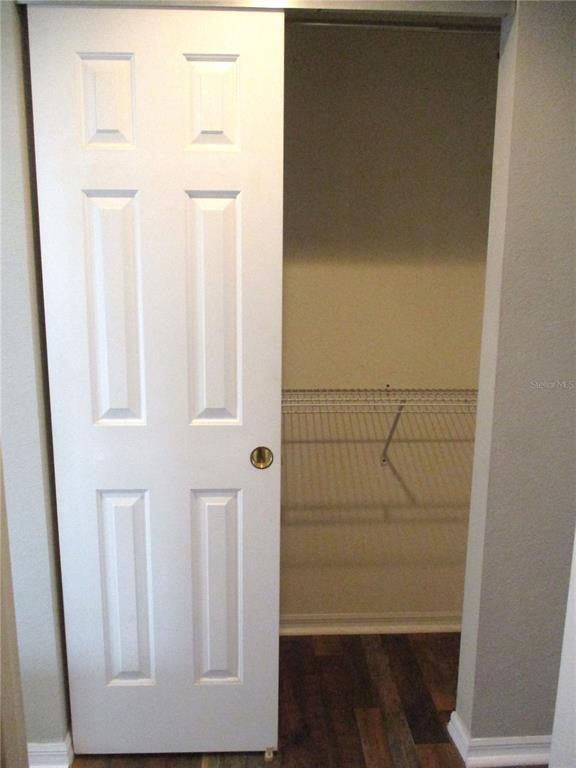 11536 Southwest 140th Loop Dunnellon, FL 34432 - Photo 20 of 75 view of empty room with wooden floor