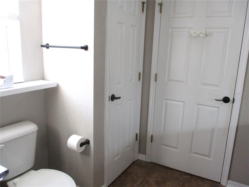 11536 Southwest 140th Loop Dunnellon, FL 34432 - Photo 24 of 75 a bathroom with a toilet and a shower