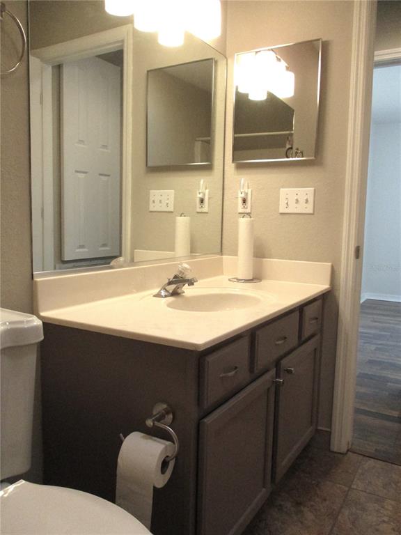 11536 Southwest 140th Loop Dunnellon, FL 34432 - Photo 29 of 75 a bathroom with a sink and a mirror