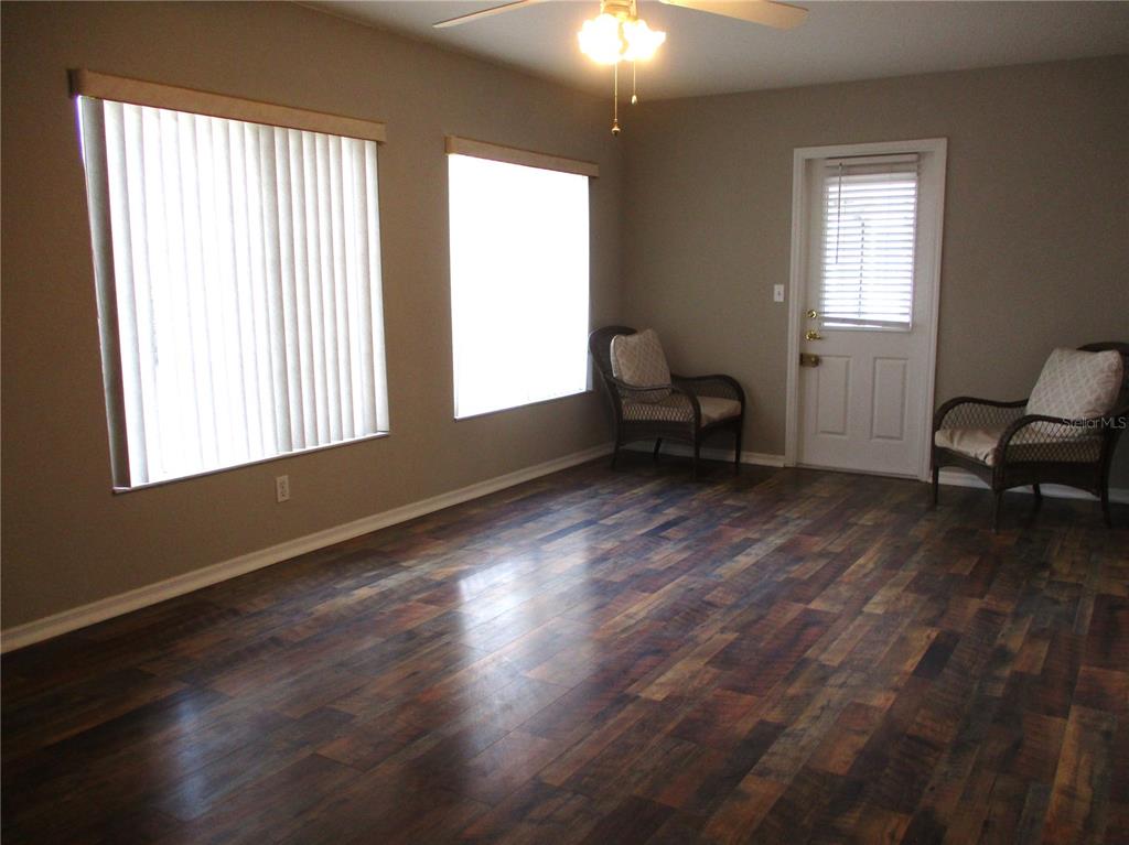11536 Southwest 140th Loop Dunnellon, FL 34432 - Photo 33 of 75 a living room with furniture and a window