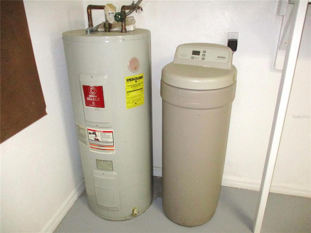 11536 Southwest 140th Loop Dunnellon, FL 34432 - Photo 45 of 75 a utility room with dryer and washer