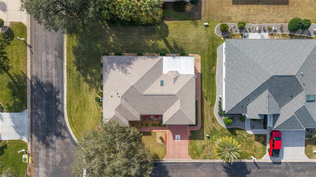 11536 Southwest 140th Loop Dunnellon, FL 34432 - Photo 48 of 75 an aerial view of a house with swimming pool and large trees