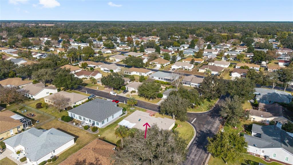 11536 Southwest 140th Loop Dunnellon, FL 34432 - Photo 51 of 75 an aerial view of residential houses with outdoor space