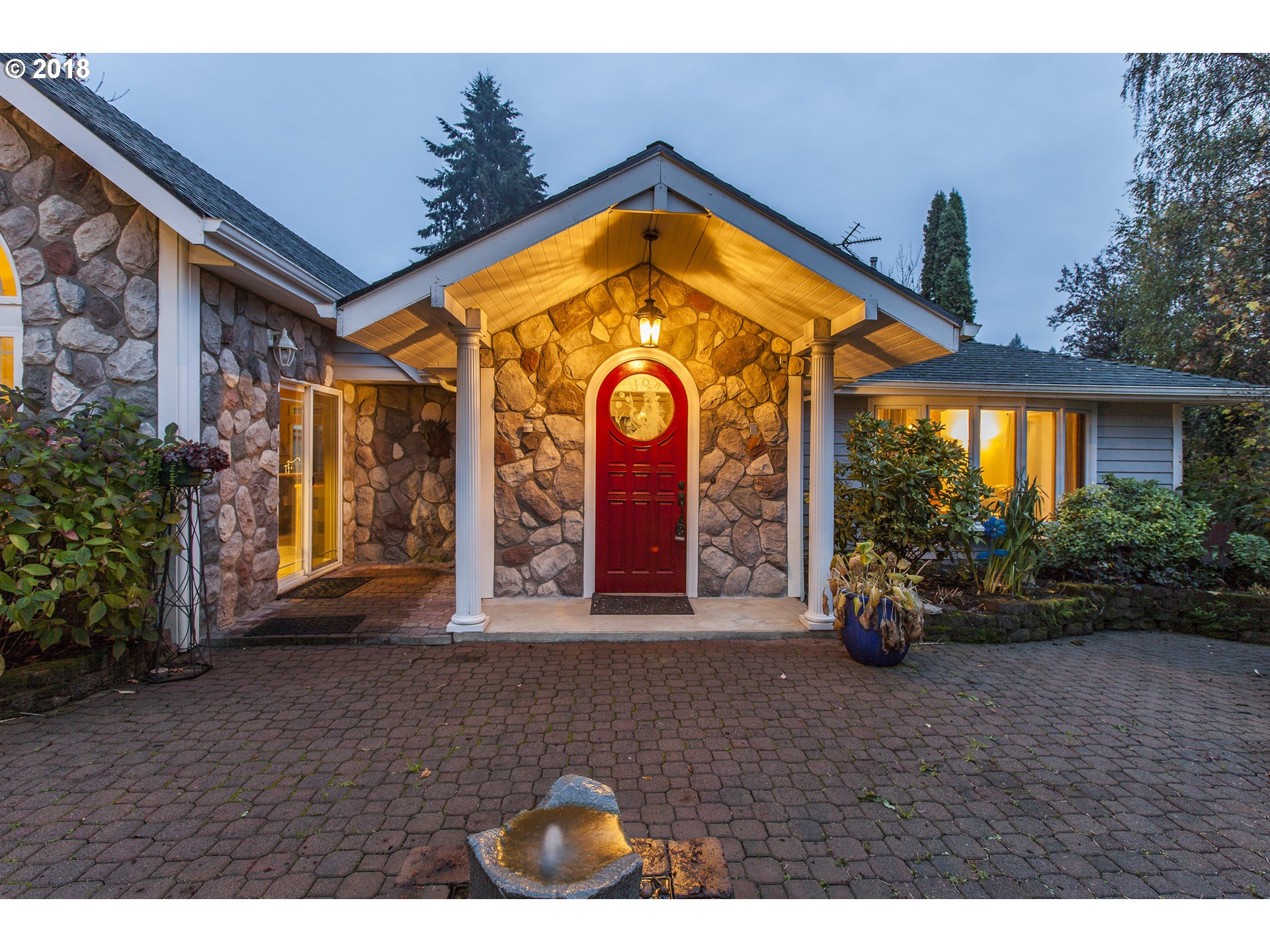 2483 Southeast Territorial Road Canby, OR 97013 - Photo 2 of 30 a view of front door with yellow lighting