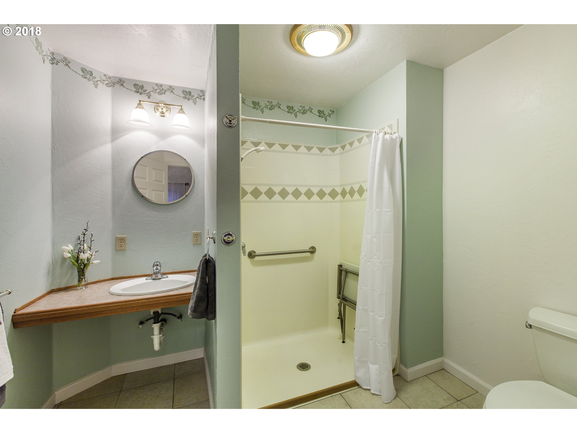 2483 Southeast Territorial Road Canby, OR 97013 - Photo 28 of 30 a bathroom with a sink mirror and shower