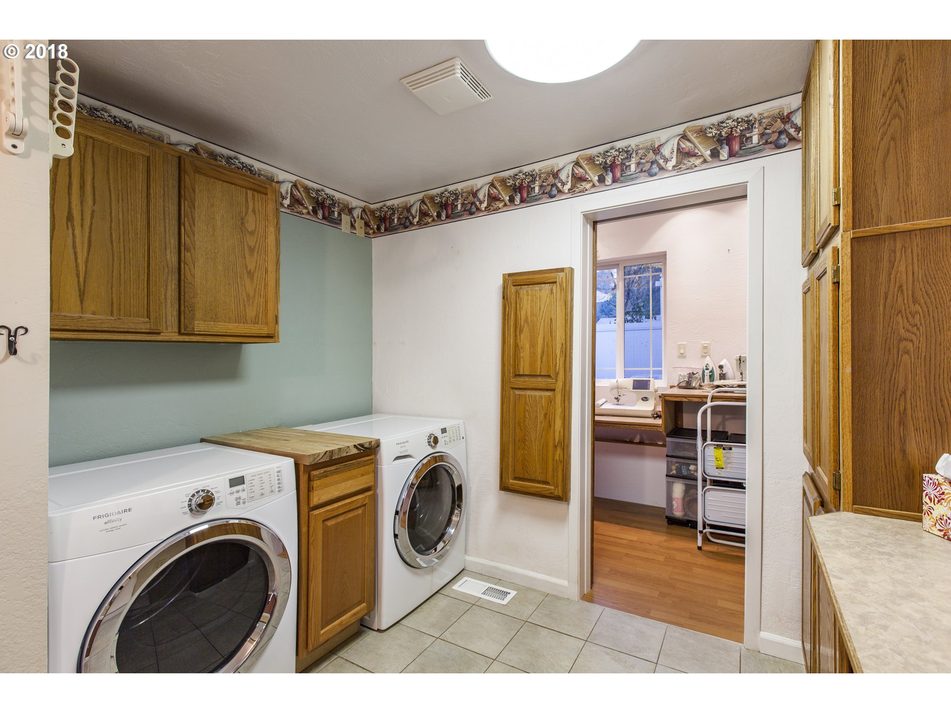 2483 Southeast Territorial Road Canby, OR 97013 - Photo 30 of 30 a view of a storage & utility room with washer and dryer
