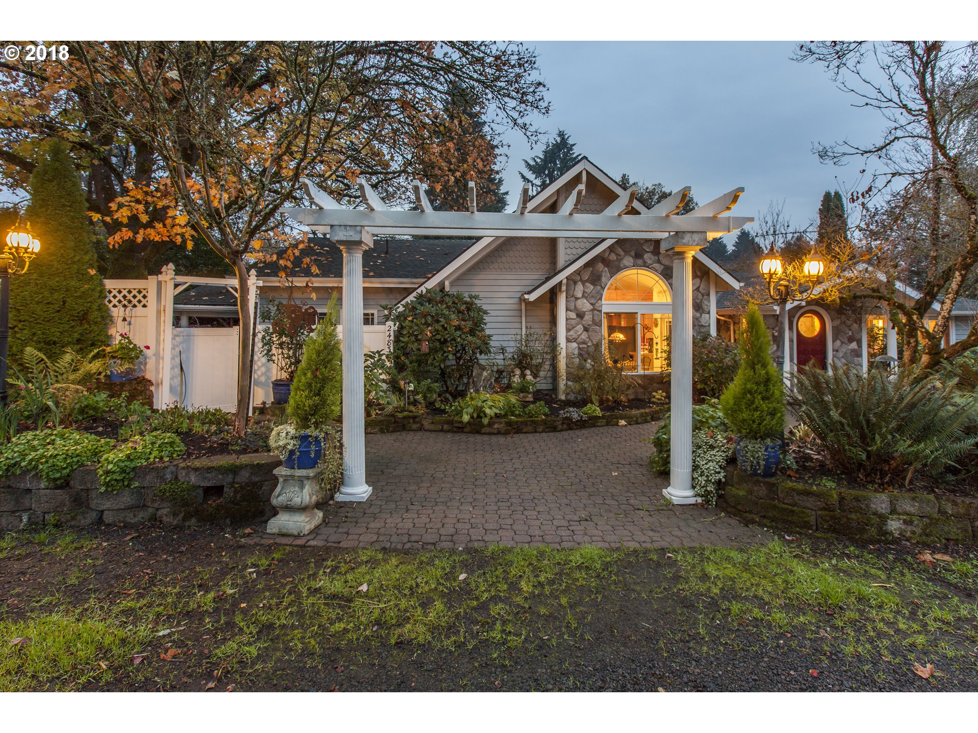 2483 Southeast Territorial Road Canby, OR 97013 - Photo 3 of 30 a view of a house with a yard and potted plants