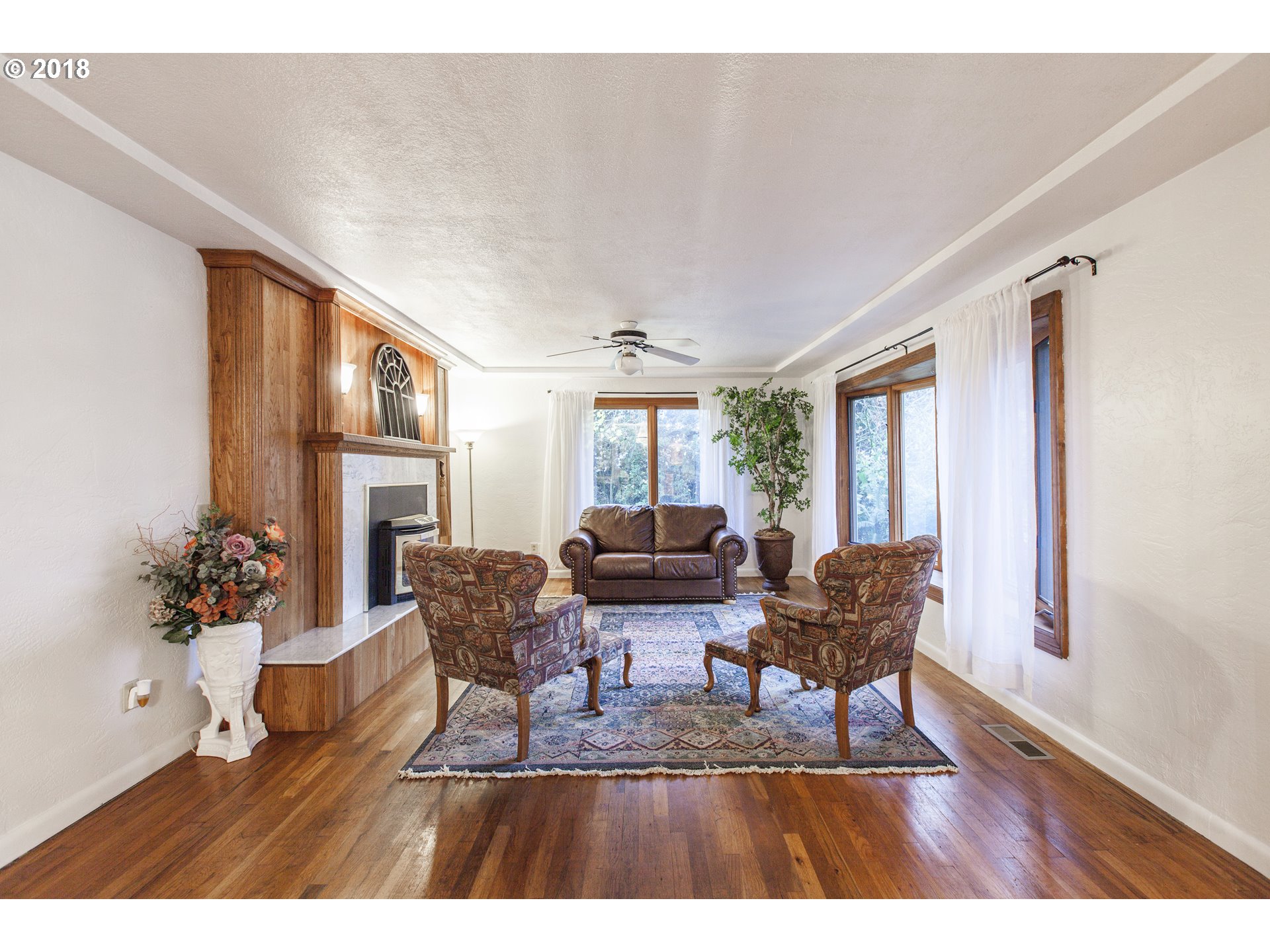 2483 Southeast Territorial Road Canby, OR 97013 - Photo 9 of 30 a living room with furniture and wooden floor