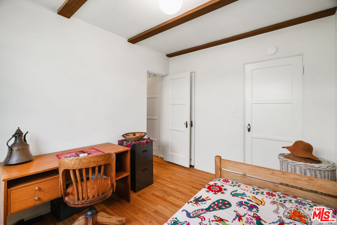 447 9th Street Santa Monica, CA 90402 - Photo 30 of 58 a bedroom with furniture and a window