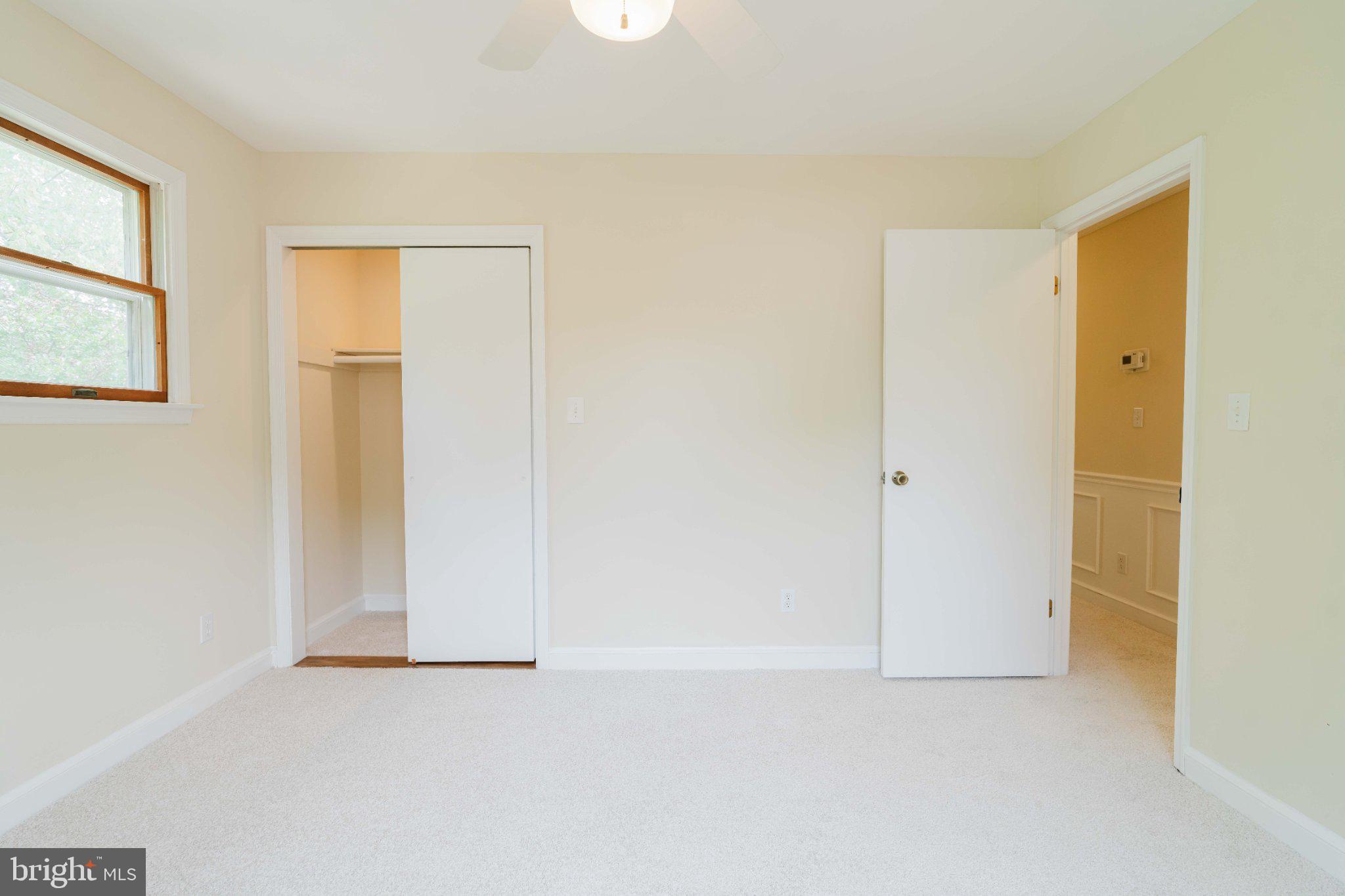 10200 Duvawn Place Silver Spring, MD 20902 - Photo 18 of 42 Bright and airy room with closet space.