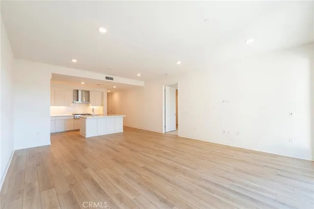 a view of kitchen with wooden floor