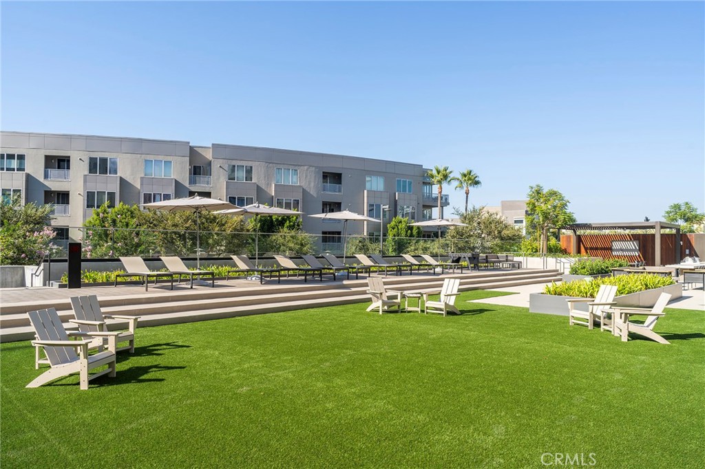 3211 Rivington Irvine, CA 92612 - Photo 41 of 49 a swimming pool with outdoor seating and yard